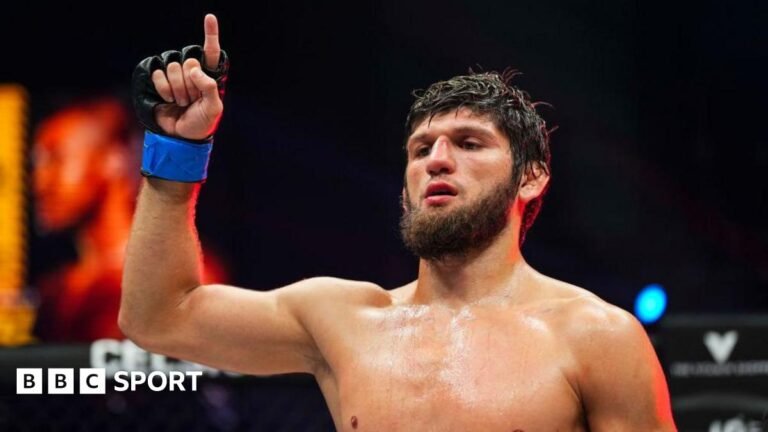 Timur Khizriev celebrates after beating Gabriel Braga in August 2024